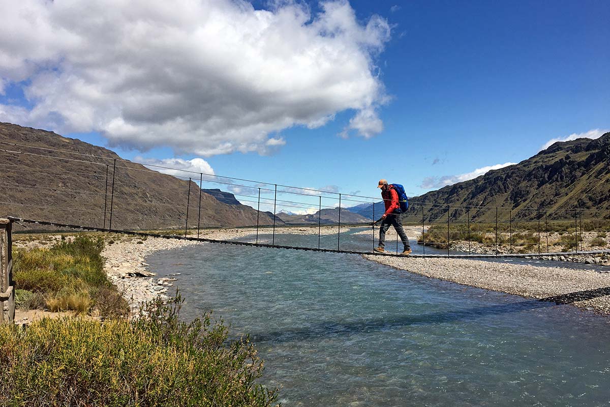 Hiking across suspension bridge on Aviles Trail (Patagonia National Park)